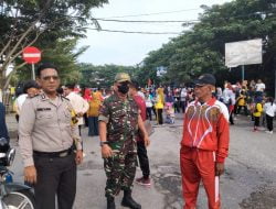 Babinsa Bersama Bhabinkamtibmas Laksanakan Pengamanan Jalan Santai Meriahkan HUT Kota Pekanbaru