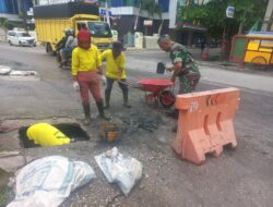 Normalisasi Parit, Serma Afriadi Bantu Pasukan Kuning di Wilayah Kelurahan Tangkerang Selatan 