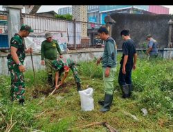 Tanam Bibit Pohon Sukun, Tindakan Nyata Koramil 04/Jebres Bersama Linmas Kelurahan Mojosongo Tingkatkan Ketahanan Pangan di Wilayah