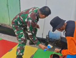 Guyub Rukun, Satgas KBD Ke-5 TA. 2025 Kodim 0735/Surakarta akhiri dengan Pengecatan Lis Jalan dan Penutup Saluran Air.