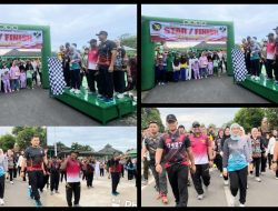 DANLANUDAD IKUTI JALAN SEHAT DALAM RANGKA HUT TNI KE-80 DI MAKODIM 0427/WAY KANAN