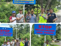 Sat Lantas Polres Dompu Pasang Papan Imbauan Kamseltibcarlantas di Jalan Lingkar Ompu Beko.